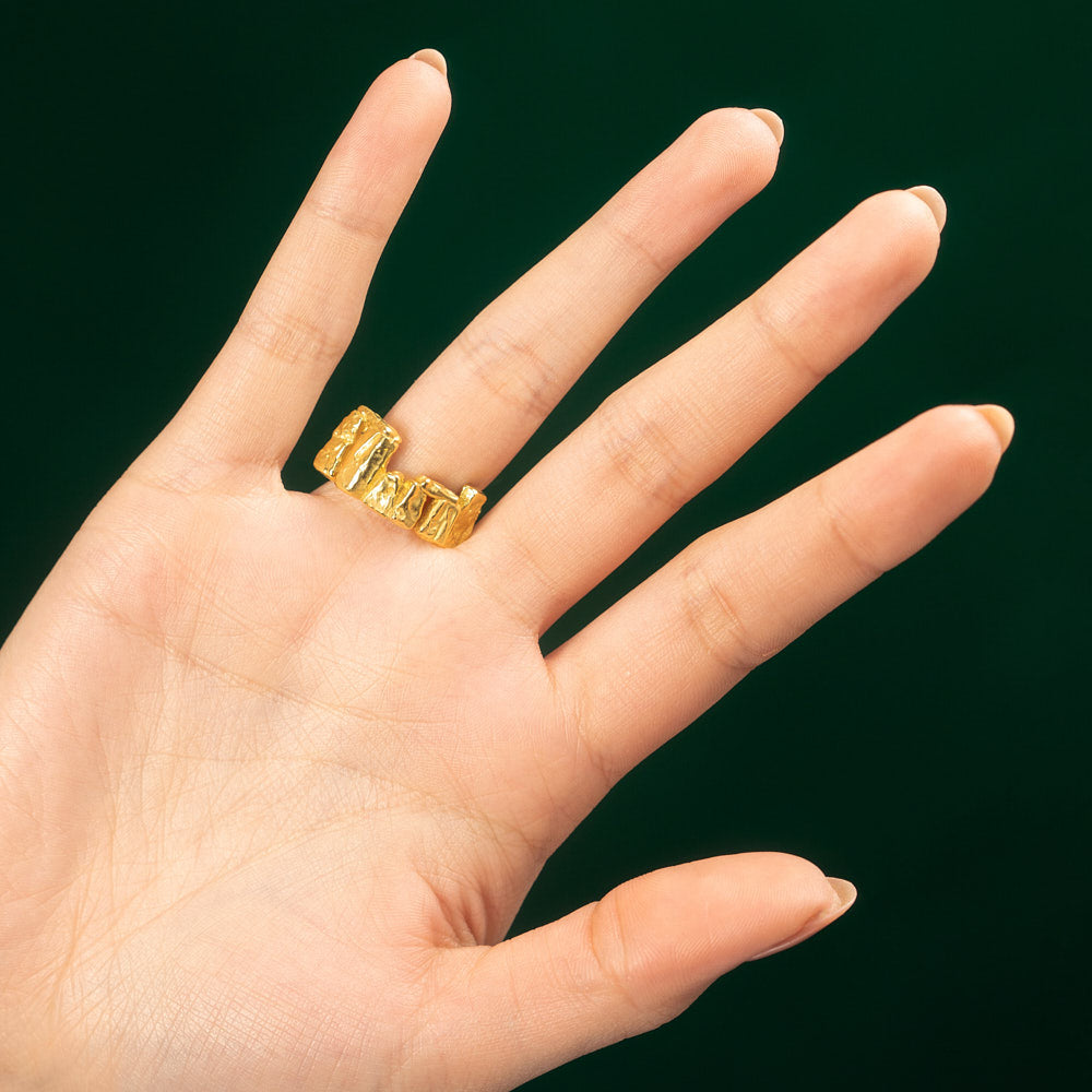 Goldhenge Stonehenge shaped ring 18 karat yellow gold by Solange Azagury-Partridge on hand back