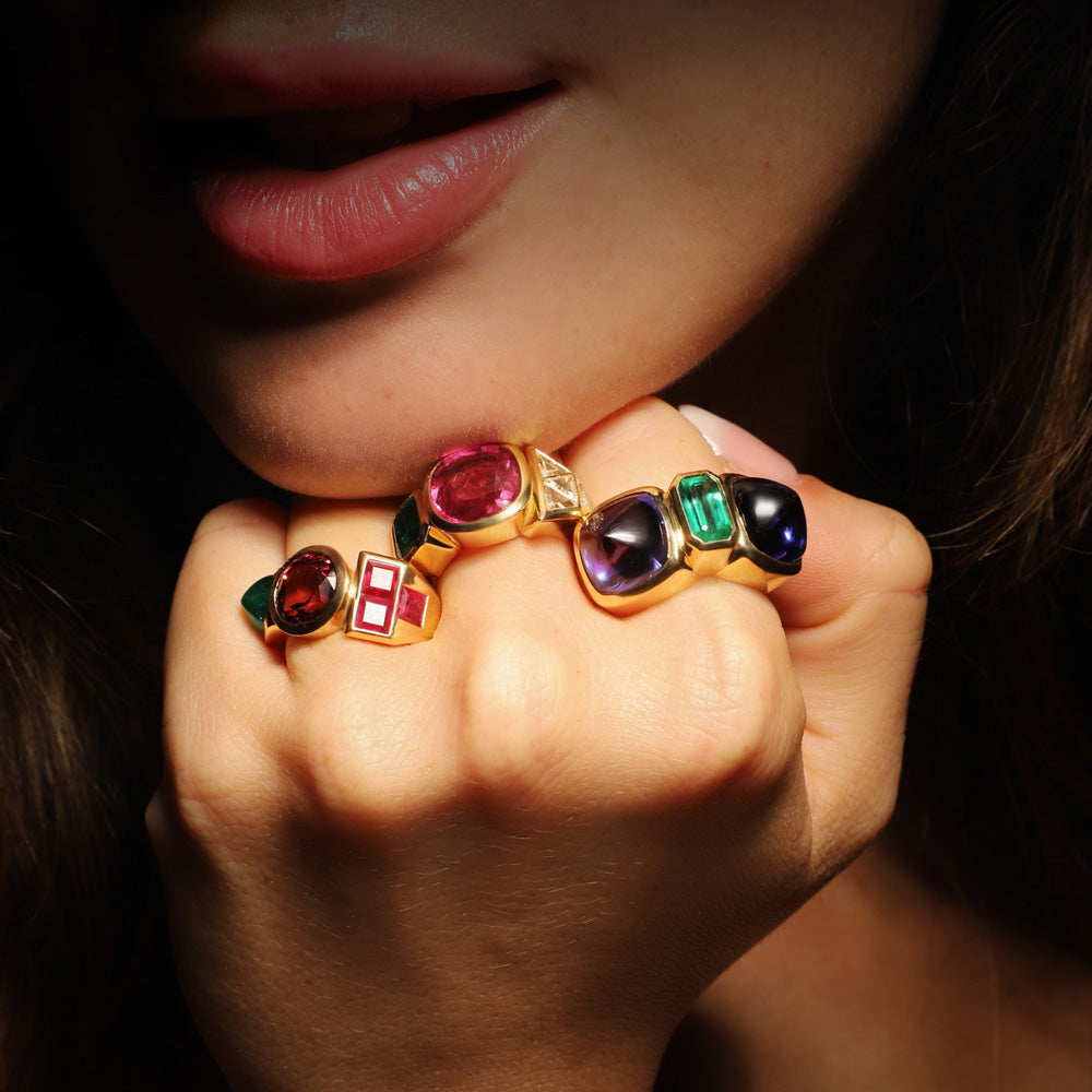 Edible ring by designer Solange Azagury-Partridge - 18 carat Yellow Gold, Tanzanite & Emerald - styling with other rings 2