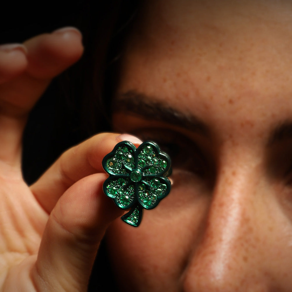 The Lucky ring by designer Solange Azagury-Partridge - Blackened 18k White Gold, Ceramic and Enamel, Emeralds - on model styling