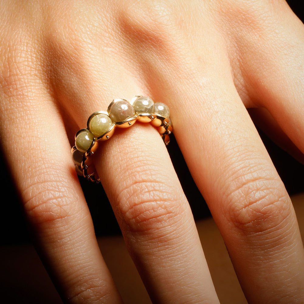 The Petrichor ring by designer Solange Azagury-Partridge - 18k Yellow Gold and Diamond Beads - front view on model