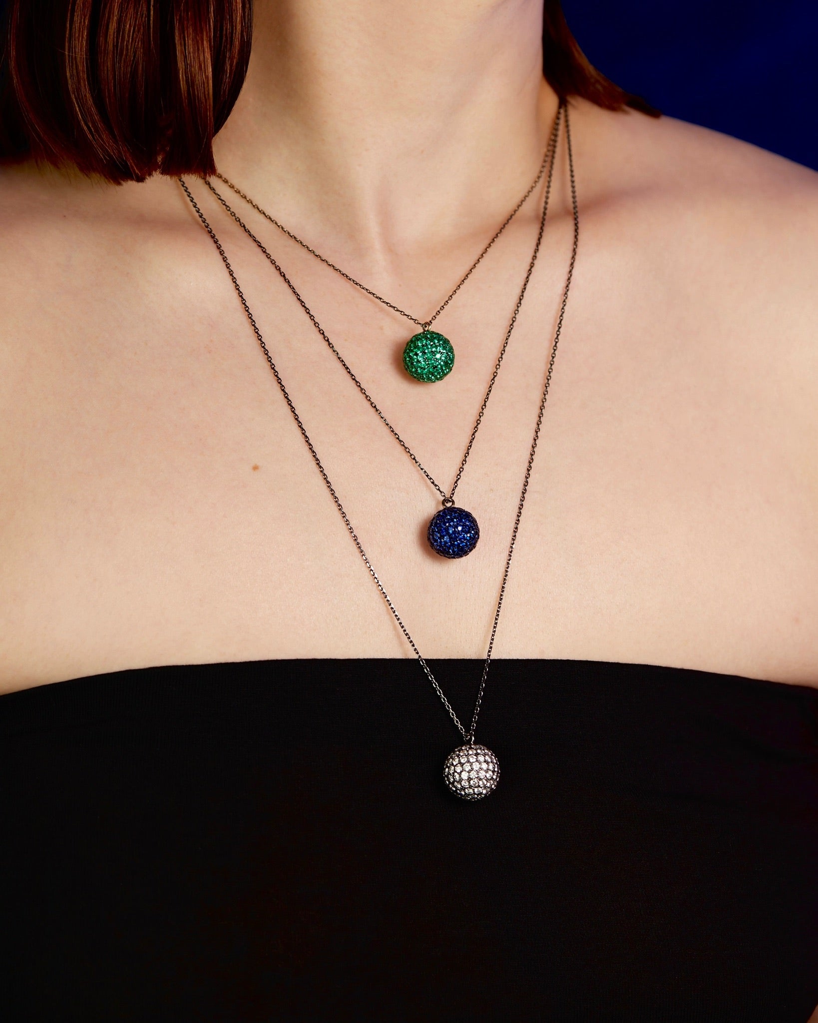 Mirror Ball Pendant White Diamonds Blue Sapphires and Emeralds set in 18k yellow gold by Solange Azagury_Partridge on Model