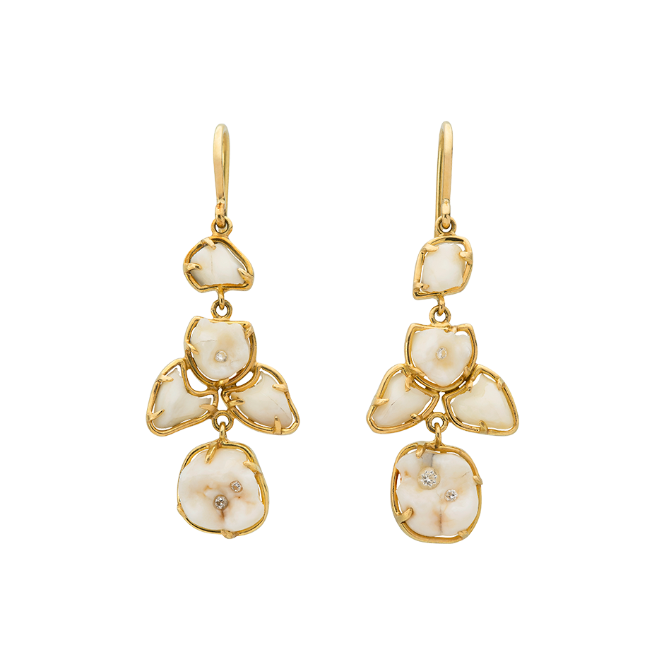 A pair of earrings with human milk teeth set in 18 karat yellow gold scattered with diamond fillings by Solange Azagury-Partridge