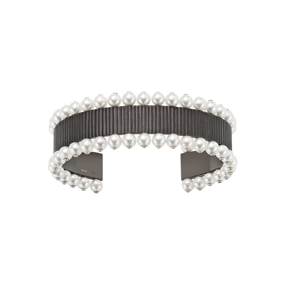 A chromaphobe cuff set with diamond and pearl in blackened 18 karat white gold by Solange Azagury-Partridge