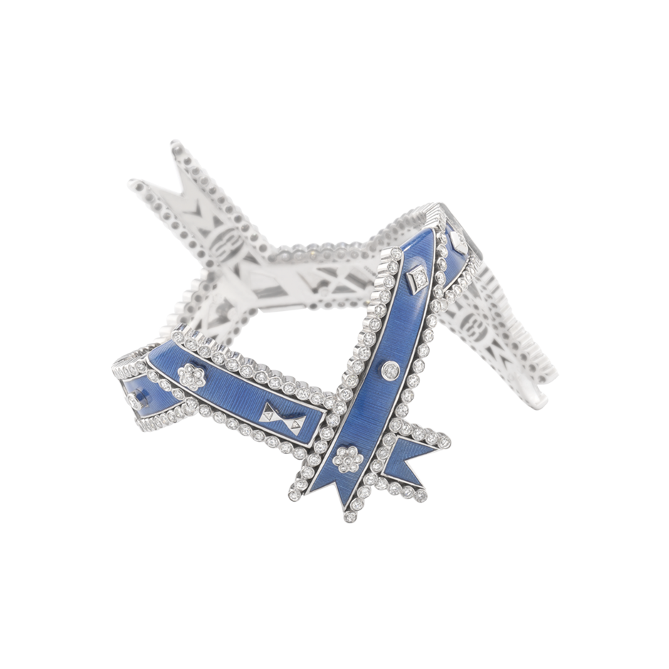 A twisted ribbon motif diamond and blue guilloché enamel regalia cuff in 18 karat white gold by Solange Azagury-Partridge