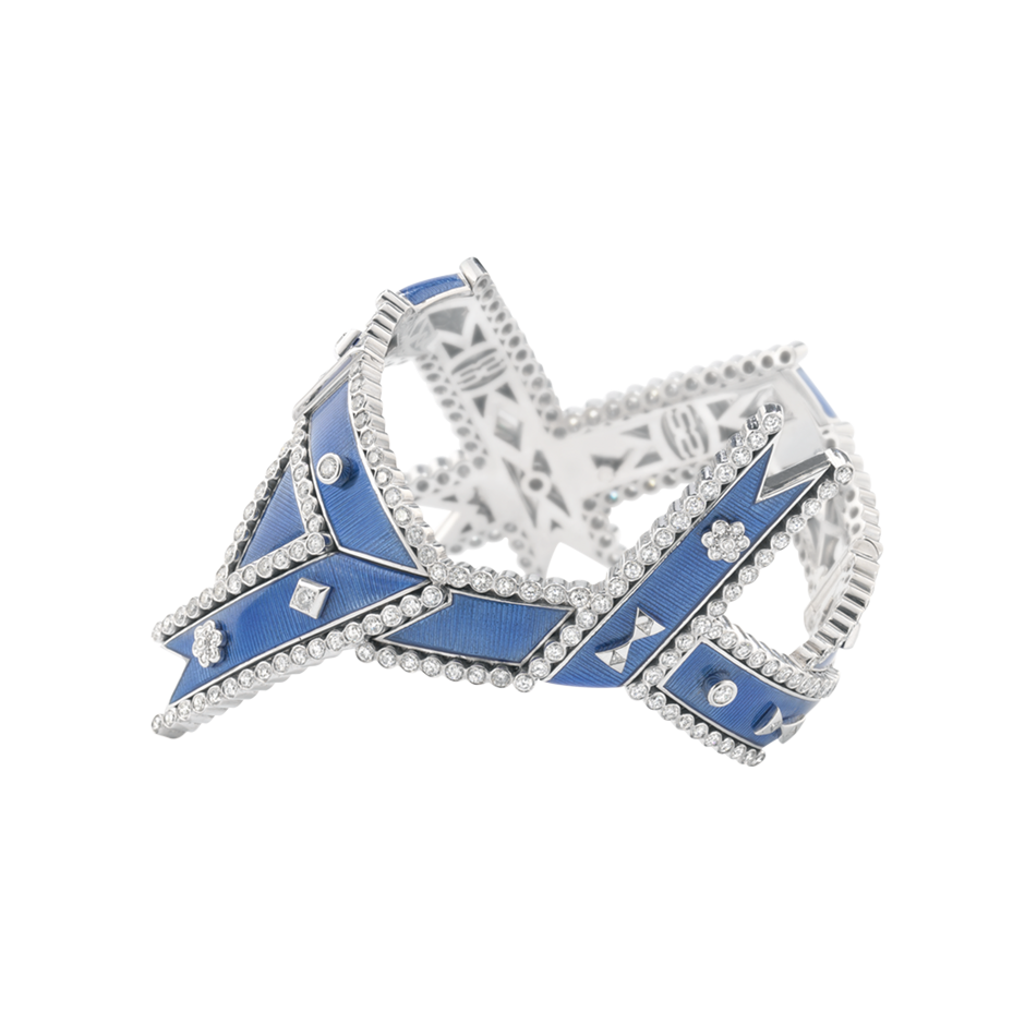 A twisted ribbon motif diamond and blue guilloché enamel regalia cuff in 18 karat white gold by Solange Azagury-Partridge