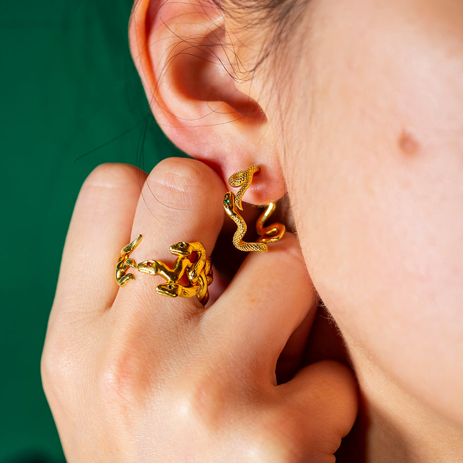 Gatekeeper Triple Snake Ring 18 Karat Yellow Gold with Emerald and Ruby Eyes by Solange Azagury-Partridge on Model with Gatekeeper hoops