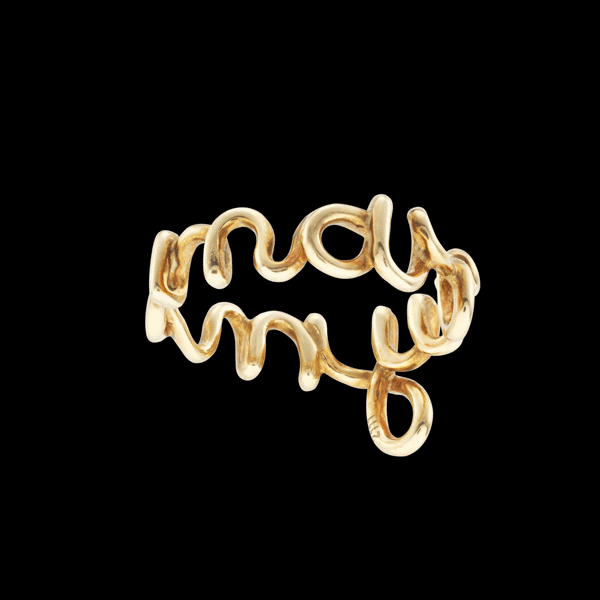Marry Me Word Ring made from wire curved into the words of marriage proposal 18k yellow gold by Solange Azagury-Partridge