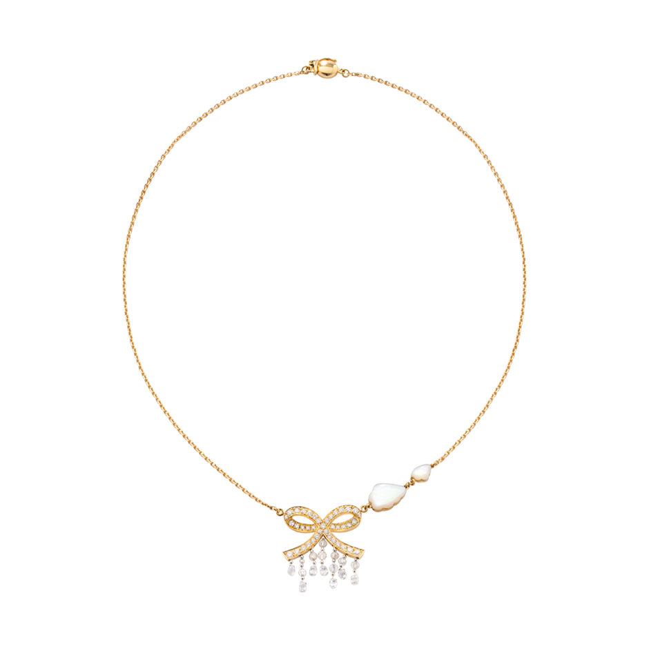 A necklace composed of a bow with diamonds, briolette diamonds drops and two mother of pearl cloud in 18 karat yellow gold by Solange Azagury-Partridge