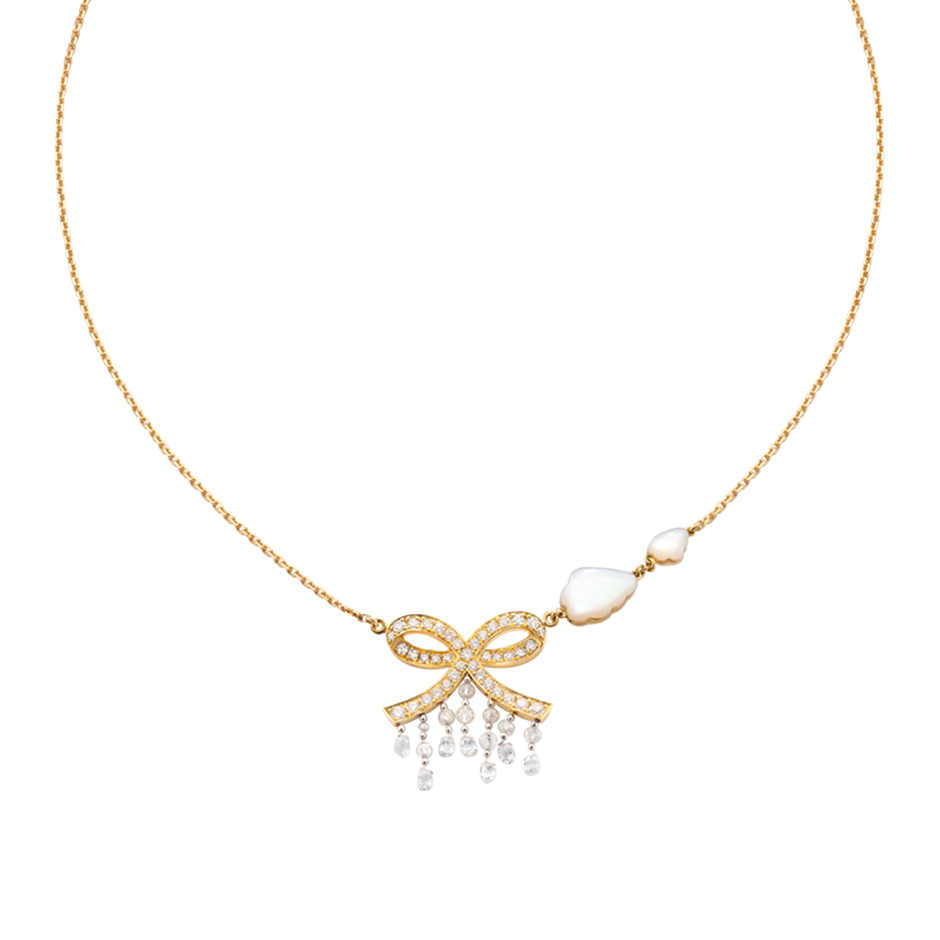 A necklace composed of a bow with diamonds, briolette diamonds drops and two mother of pearl cloud in 18 karat yellow gold by Solange Azagury-Partridge
