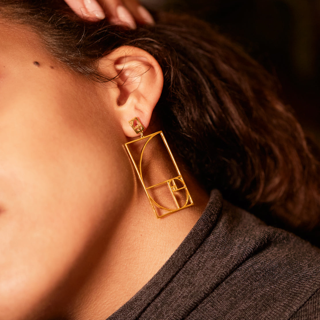 Golden Ratio Spiral Dangling Earrings 18 Karat Yellow Gold by Solange Azagury-Partridge on model