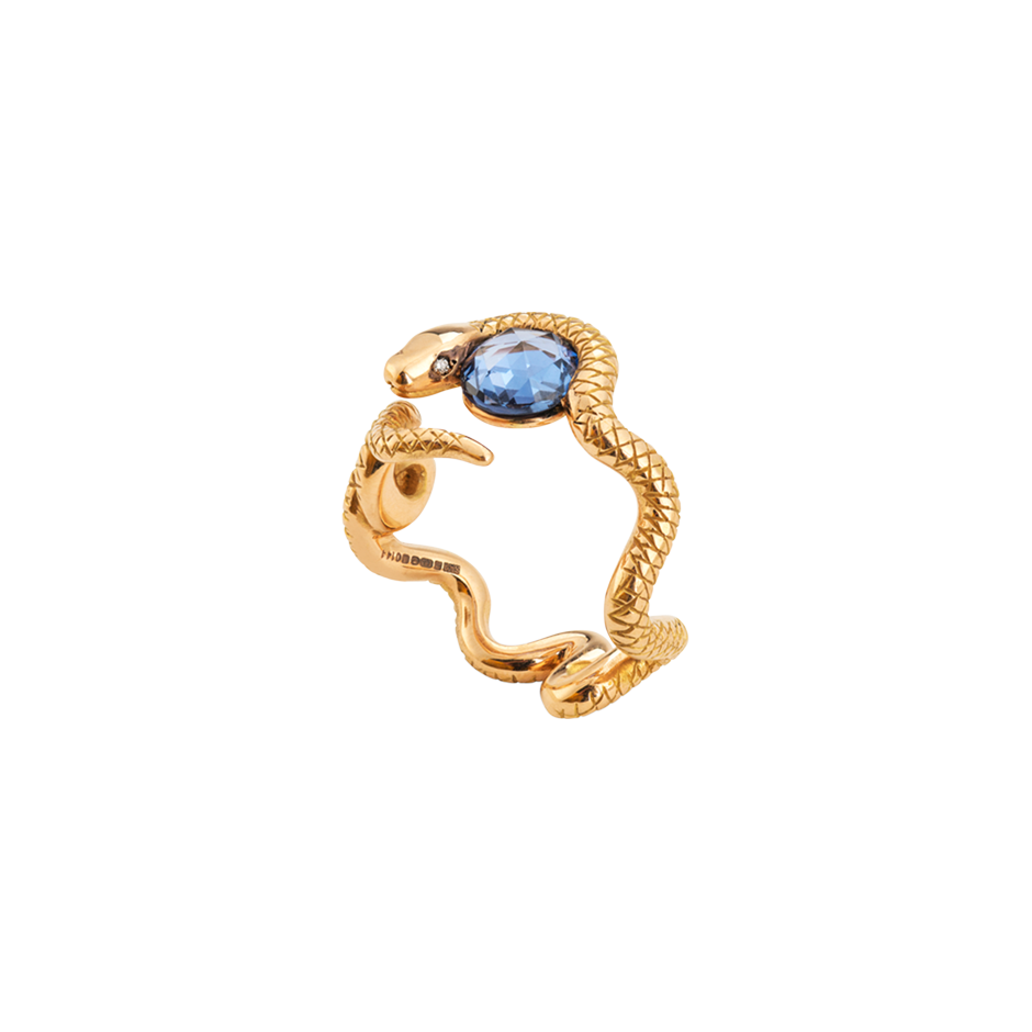 A central blue sapphire surrounded by a writhing snake with diamonds eyes in 18 karat rose gold by Solange Azagury-Partridge