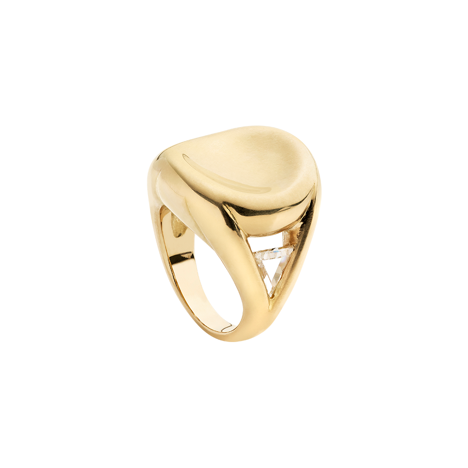 A 18 karat yellow gold ring with concave top and two triangular diamonds into two triangle hole on the side by Solange Azagury-Partridge