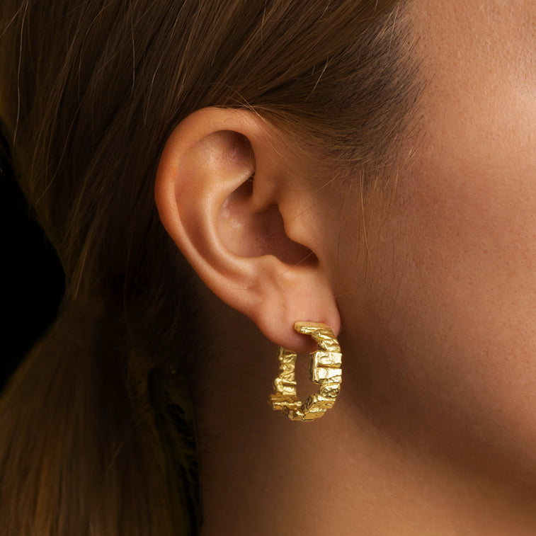 Gold Henge Earrings in 18karat yellow god by Solange Azagury-Partridge on model