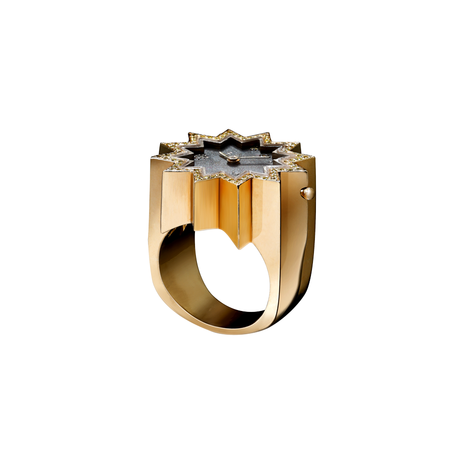 A star shaped analogue watch ring with diamonds for the numbers and diamonds pavé surrounding in 18 karat yellow gold by Solange Azagury-Partridge