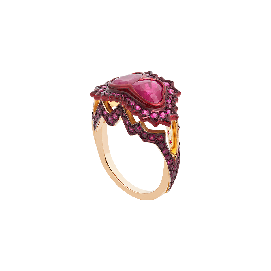 A ring composed of two heart shaped rubies supported by pavé set ruby heartbeat with red lacquer and ceramic plate set in 18 karat rose gold by Solange Azagury-Partridge