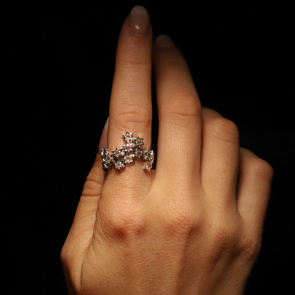 Aster star cut diamond ring by designer Solange Azagury-Partridge - 18 carat white gold on model