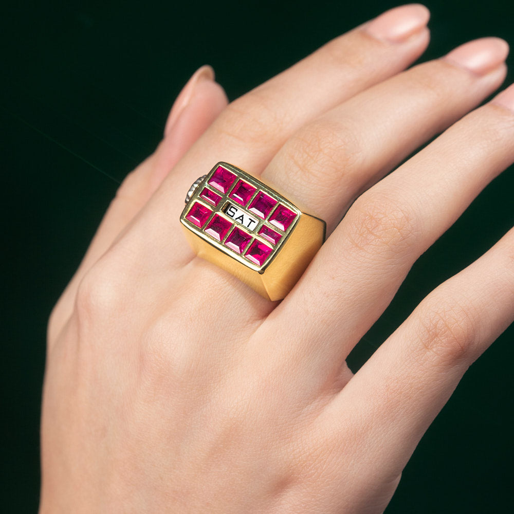 Revolving Days of the Week Ring with Ruby Face, Diamond Scroll, and 18 karat yellow gold by Solange Azagury-Partridge