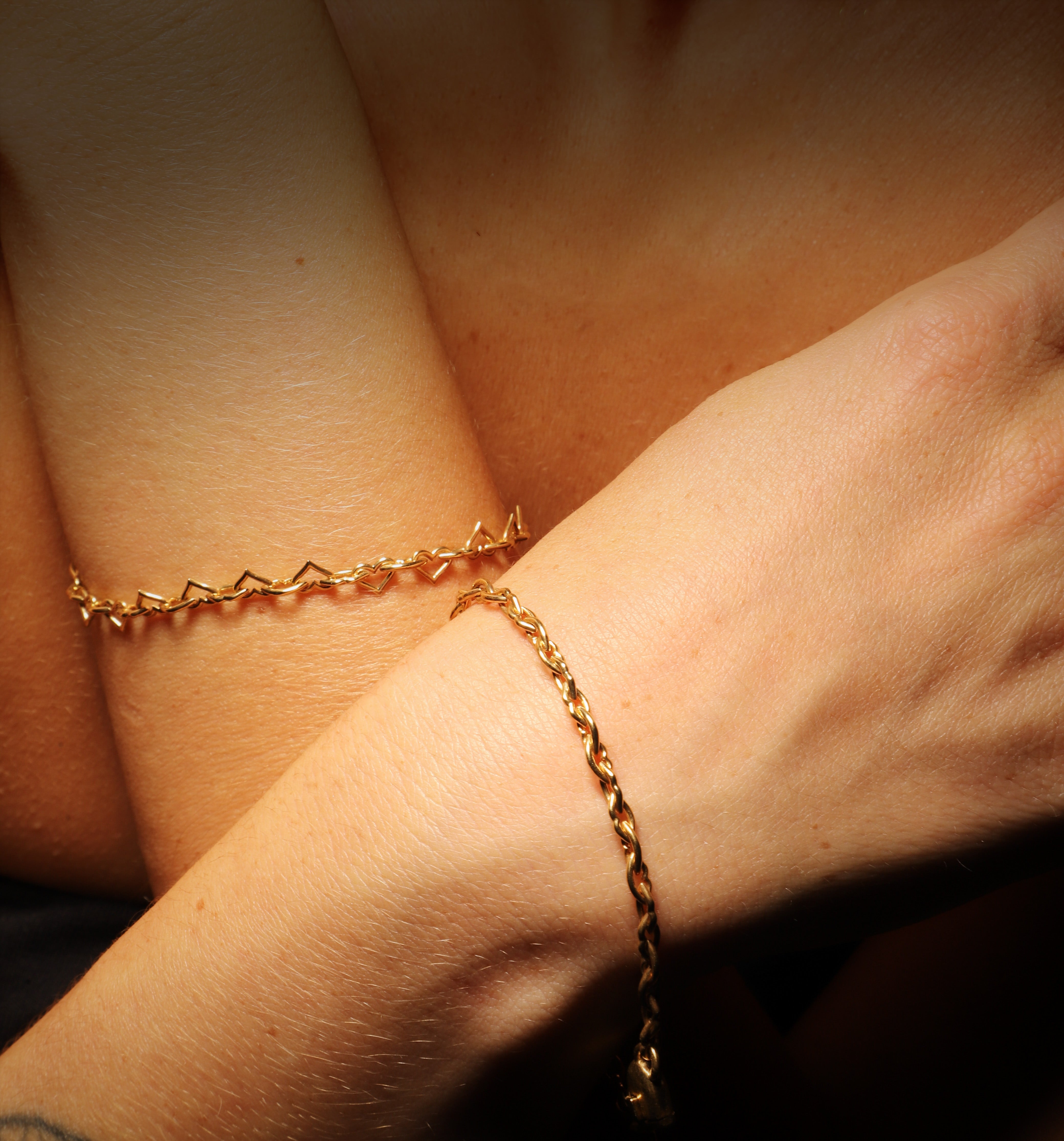 Love & Kisses Chain Bracelet by designer Solange Azagury Partridge - 18 carat Yellow Gold - model styling 1