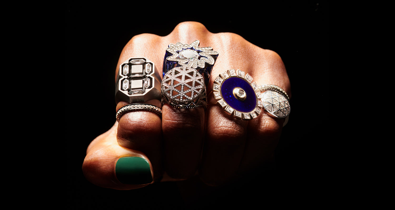A fistful of diamond enamel and 18 karat white gold rings by Solange Azagury-Partridge