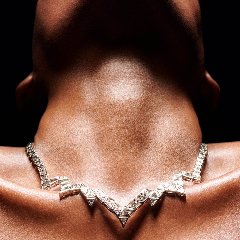 Triangle Diamond Necklace set with Triangle Set Diamond in 18 karat white gold by Solange Azagury-Partridge on neck
