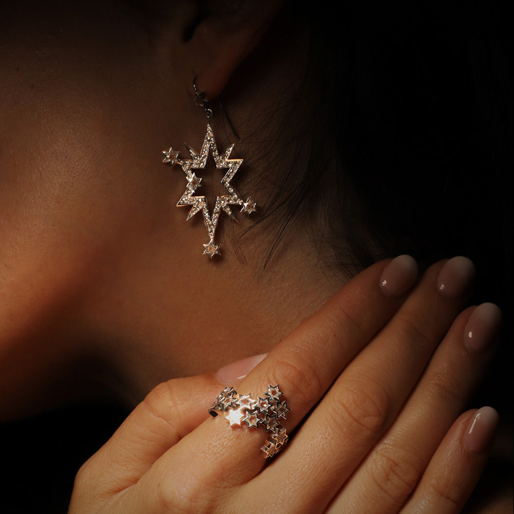 Aster Earrings by designer Solange Azagury-Partridge - 18k White Gold, star cut and rose cut diamonds - earring and ring styling