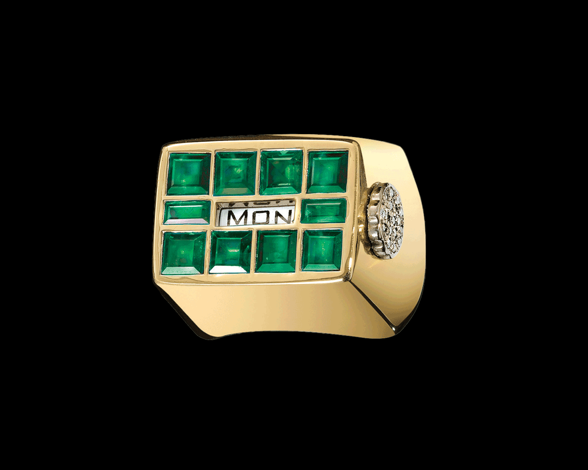 Days of the Week Rotating Emerald and 18 karat gold ring gif