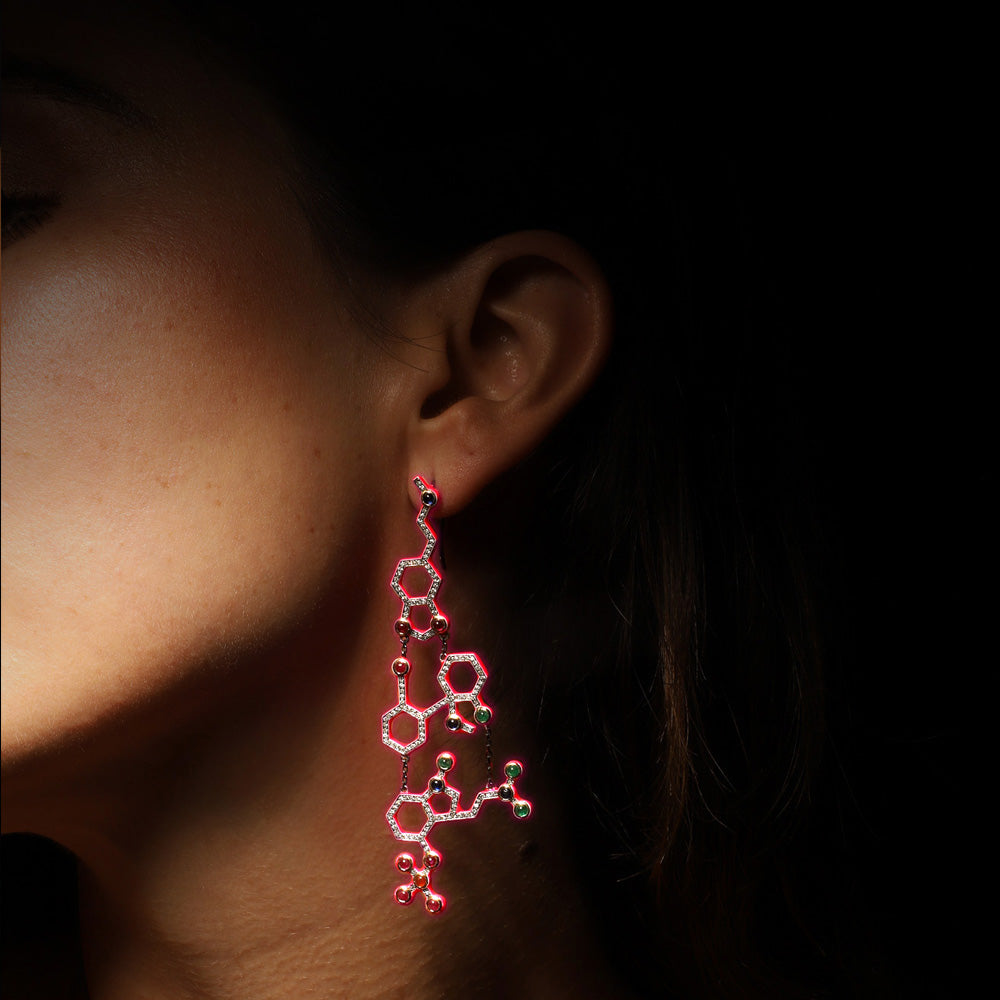 Euphorian earrings by designer Solange Azagury-Partridge - Blackened 18 carat White Gold Emerald, Sapphire, Ruby, Cornelian, Diamonds and neon pink enamel - on model