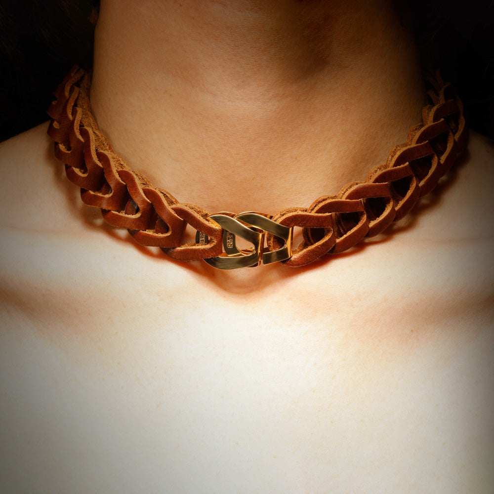 Gladiator necklace by designer Solange Azagury-Partridge - Leather and 18 carat gold - front view on model