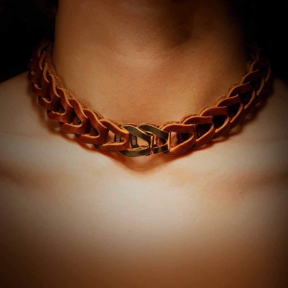 Gladiator necklace by designer Solange Azagury-Partridge - Leather and 18 carat gold - front view on model