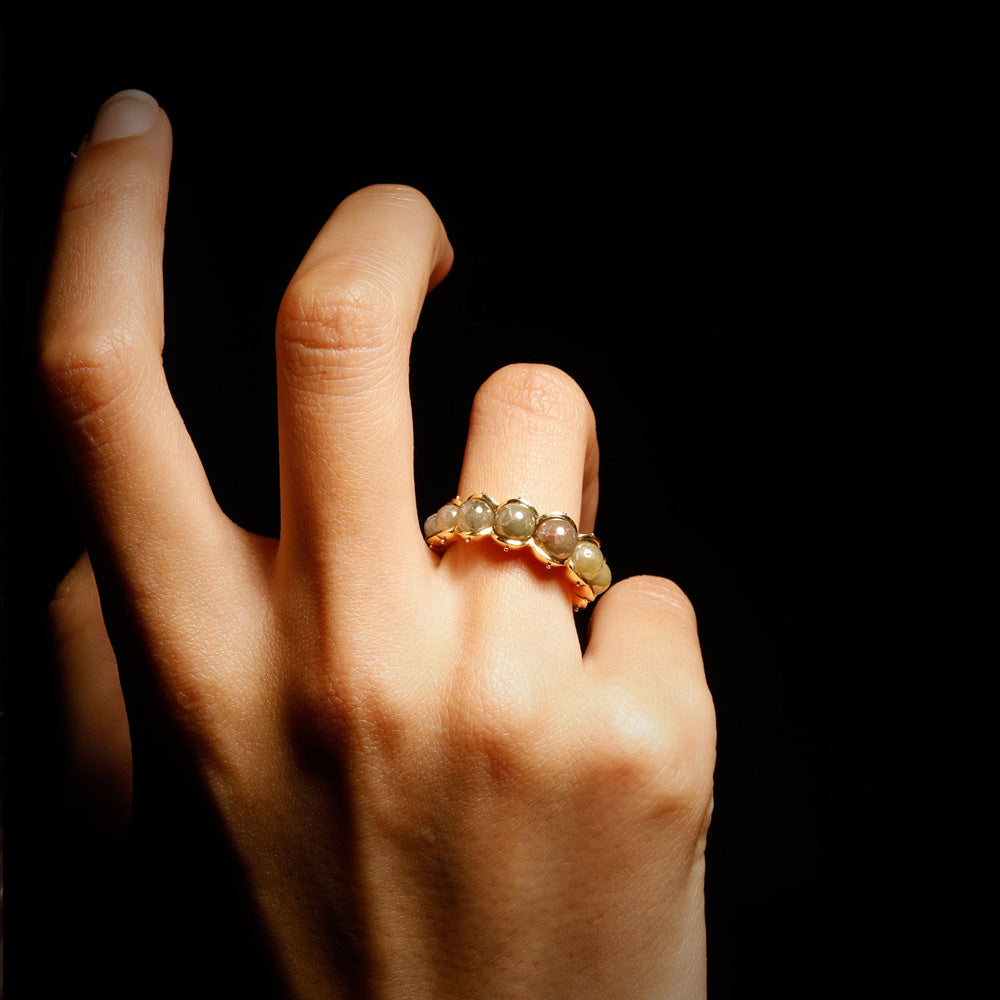The Petrichor ring by designer Solange Azagury-Partridge - 18k Yellow Gold and Diamond Beads - front view on model 2