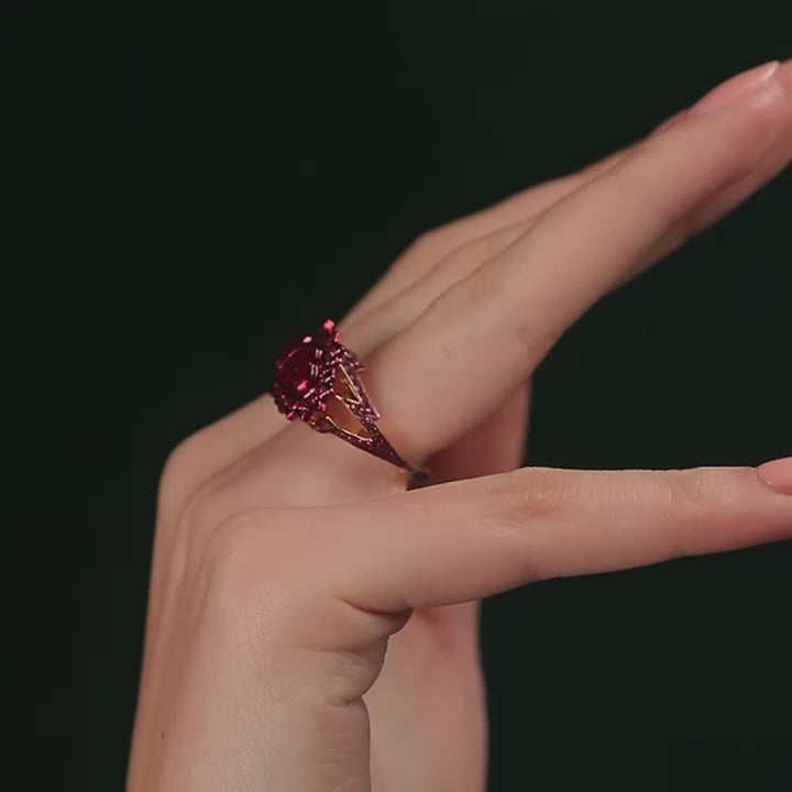 A ring composed of two heart shaped rubies supported by pavé set ruby heartbeat with red lacquer and ceramic plate set in 18 karat rose gold by Solange Azagury-Partridge Video On Hand