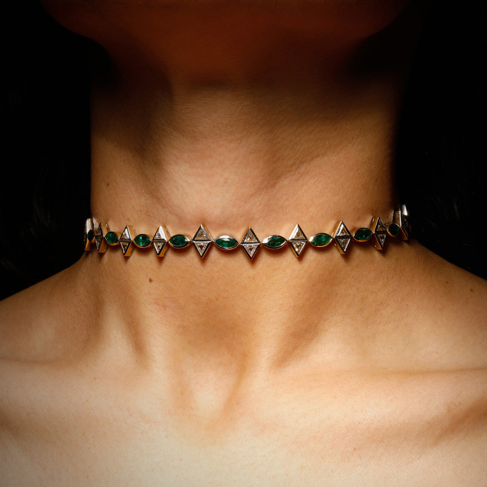 The Romantic Necklace by designer Solange Azagury-Partridge - Blackened 18 carat White Gold and Emeralds & Diamonds - side view on model