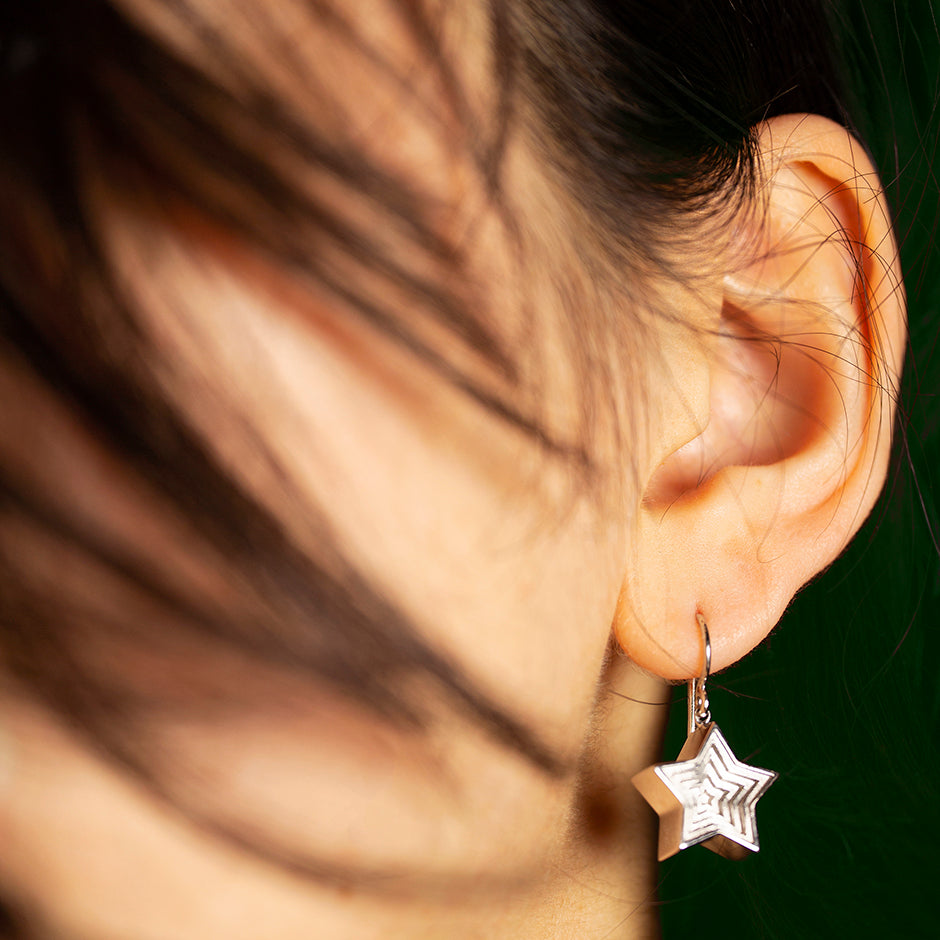 Star 24:7 Graphic shaped earrings in 18 karat white gold on french hooks by Solange Azagury-Partridge On Models Ear