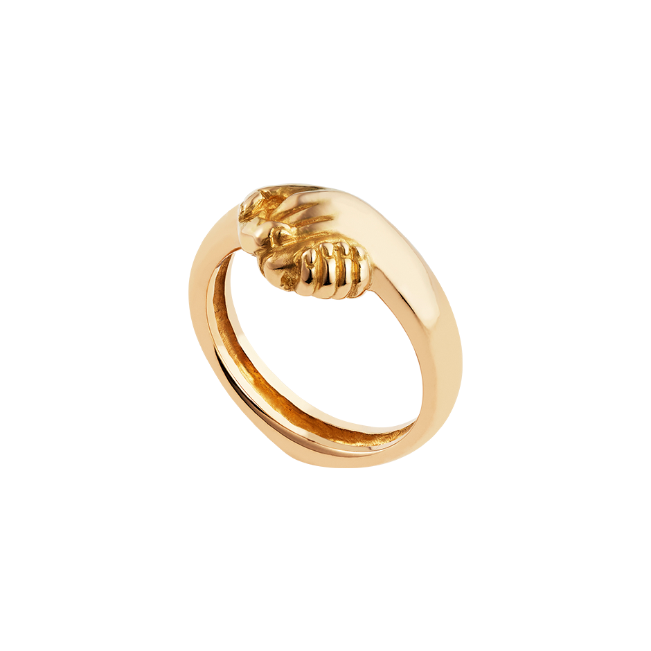 A friendship ring composed of two holding hands in 18 karat yellow gold by Solange Azagury-Partridge