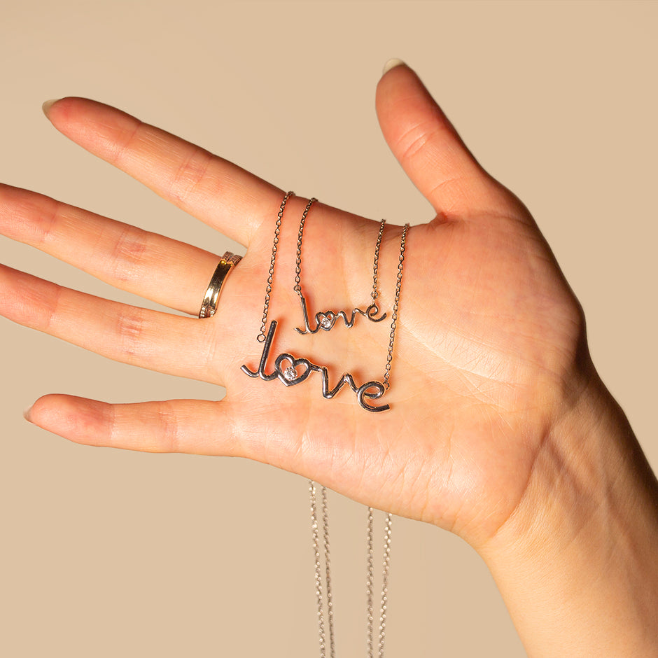 Love Written Large Diamond Pendant