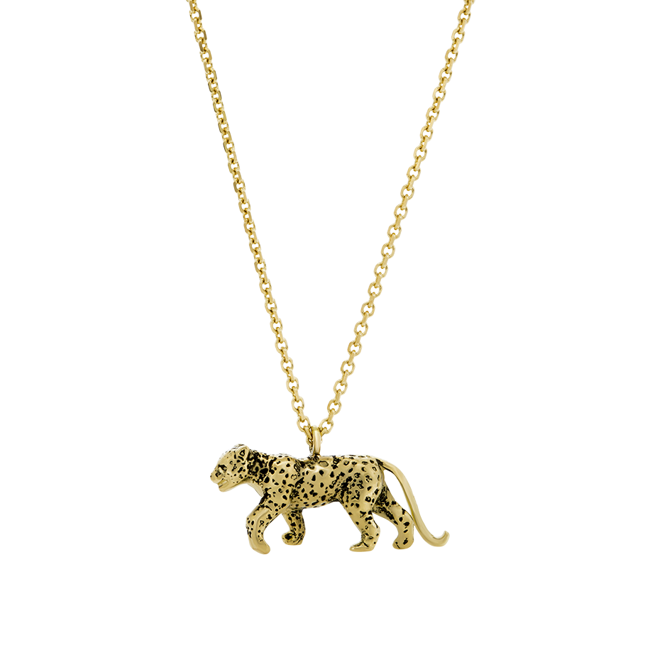 A leopard pendant in 18 karat yellow gold with blackened spots on a chain by Solange Azagury-Partridge