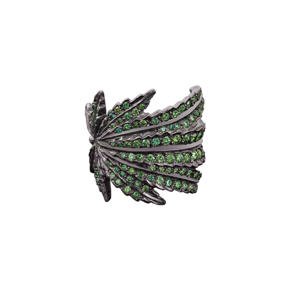 A marijuana leaf motif ring set with round brilliant cut green diamonds in blackened 18 karat white gold﻿ by Solange Azagury-Partridge