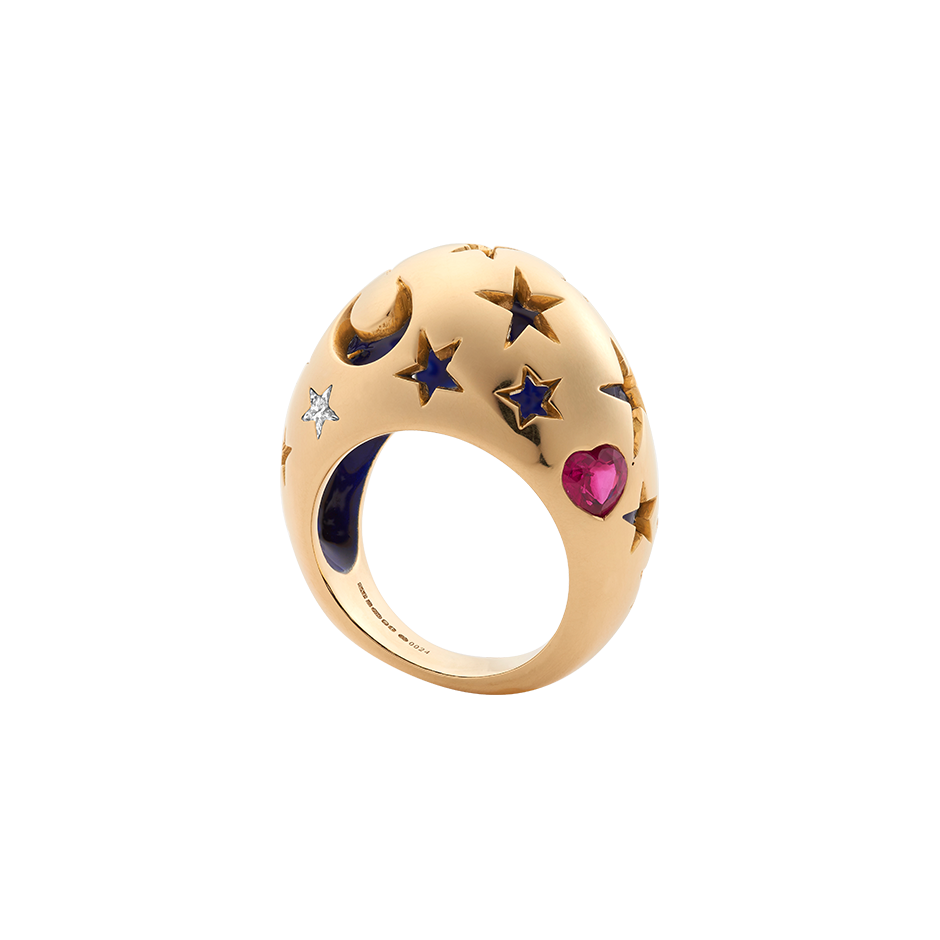 A night sky bombe ring with a diamond star, ruby heart and midnight blue lacquer inside set in 18 karat yellow gold by Solange Azagury-Partridge