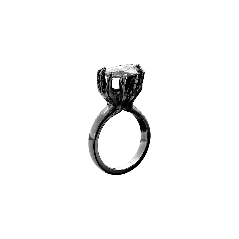 A rose cut diamond held by two outstretched hands ring in blackened 18 karat white gold by Solange Azagury-Partridge