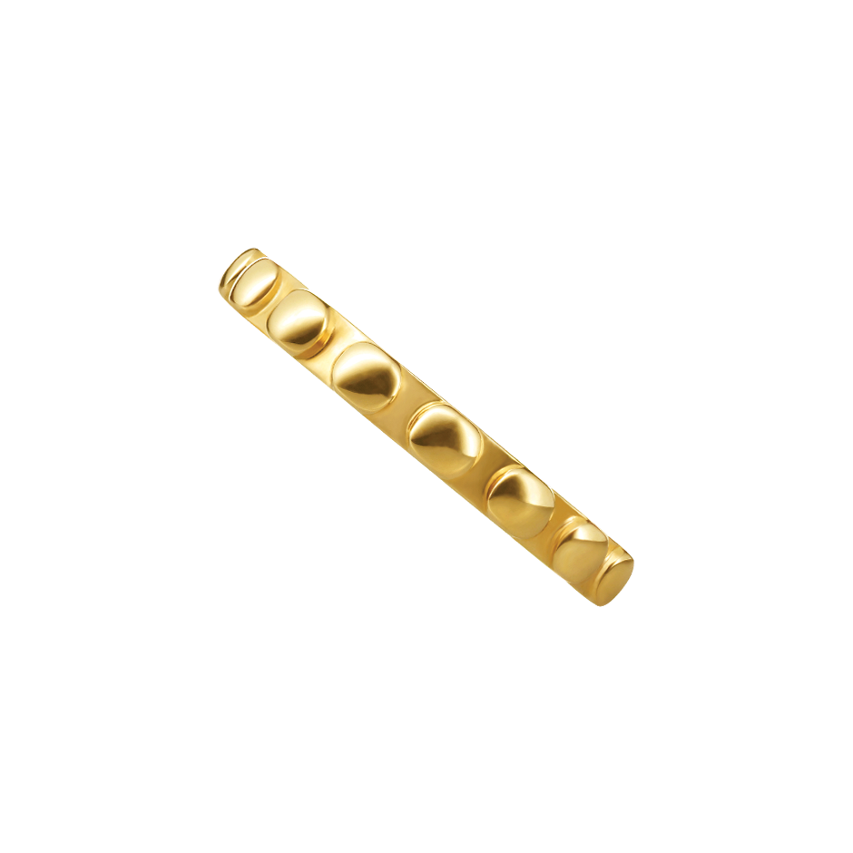 A raised round motif patterned band ring in 18 karat yellow gold by Solange Azagury-Partridge