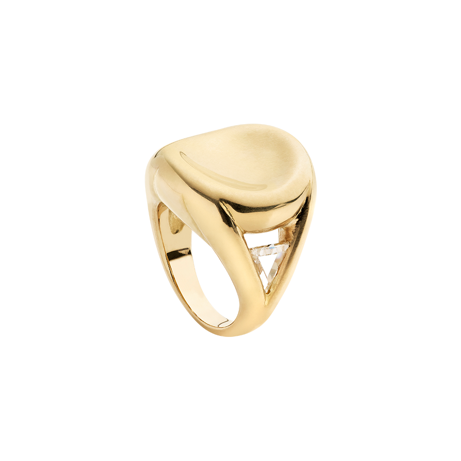 A 18 karat yellow gold ring with concave top and two triangular diamonds  into two triangle hole on the side by Solange Azagury-Partridge
